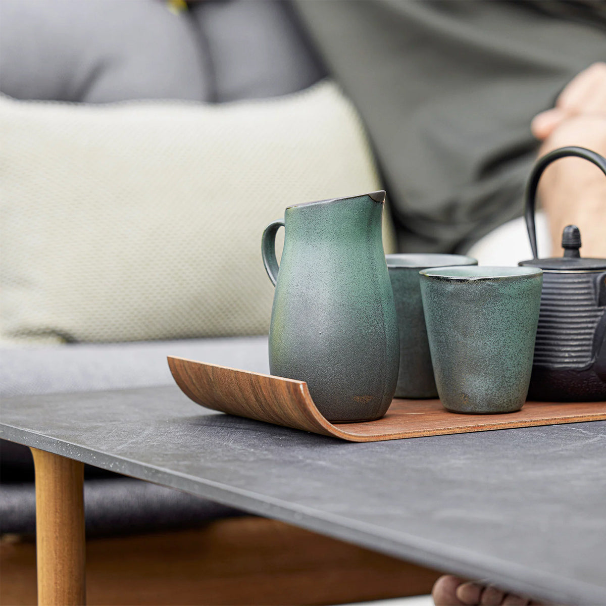 Twist Rectangular Coffee Table by Cane-Line, showing closeup view of twist rectangular coffee table in live shot.