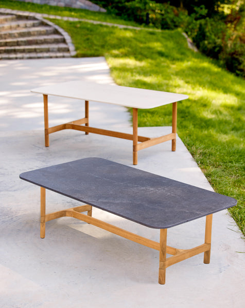 Twist Rectangular Coffee Table by Cane-Line, showing twist rectangular coffee tables in live shot.