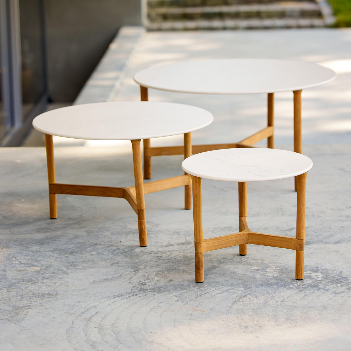 Twist Coffee Table by Cane-Line, showing twist coffee table in live shot.