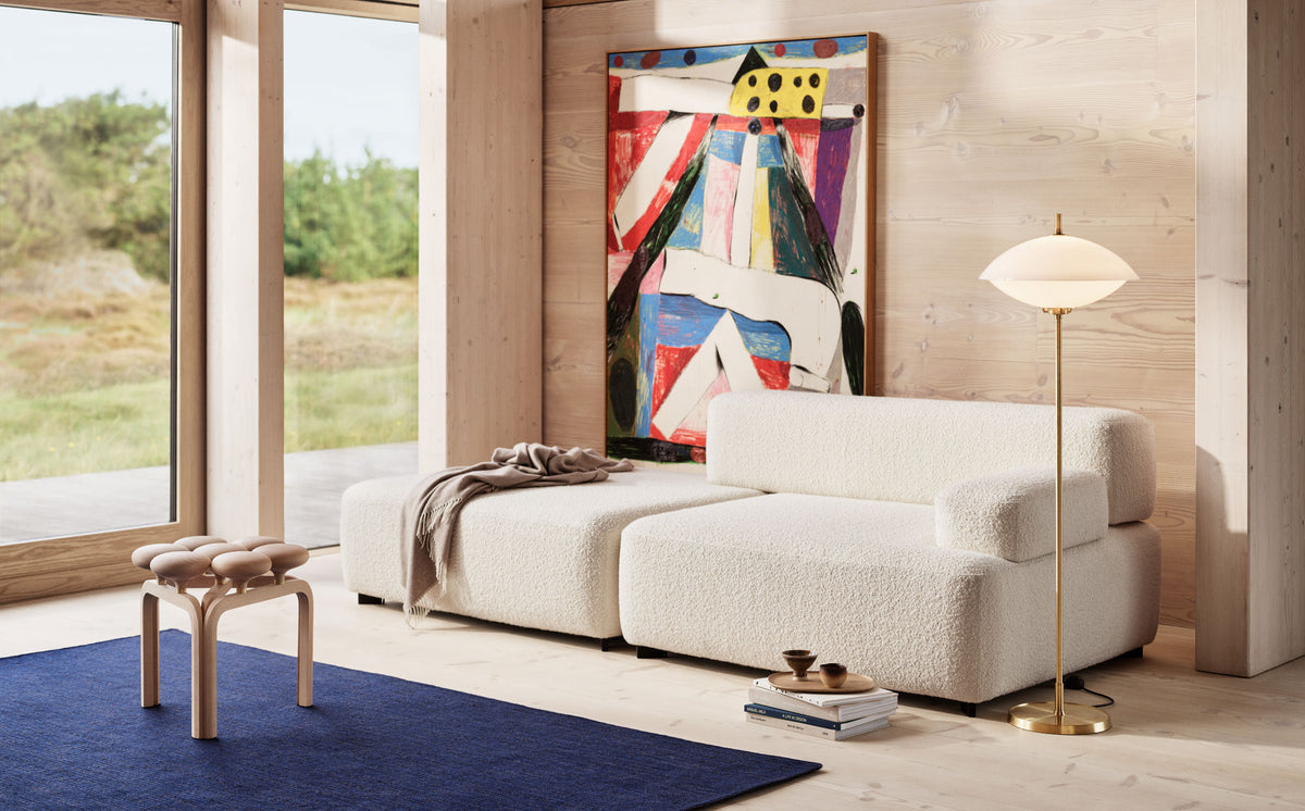 Utzon Stool by Fritz Hansen, showing utzon stool in live shot.