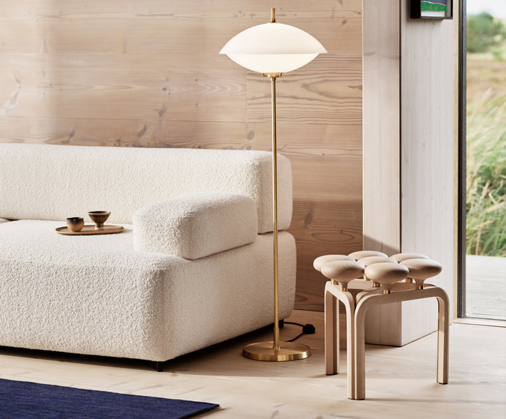 Utzon Stool by Fritz Hansen, showing utzon stool in live shot.