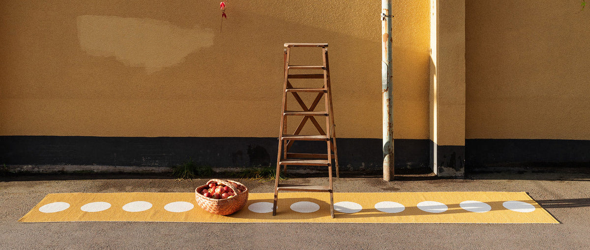Vera Ochre & Vanilla Runner Rug by Pappelina, showing of vera ochre & vanilla runner rug in live shot.