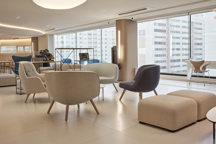 Via57 Lounge Chair by Fritz Hansen, showing via57 lounge chairs in live shot.