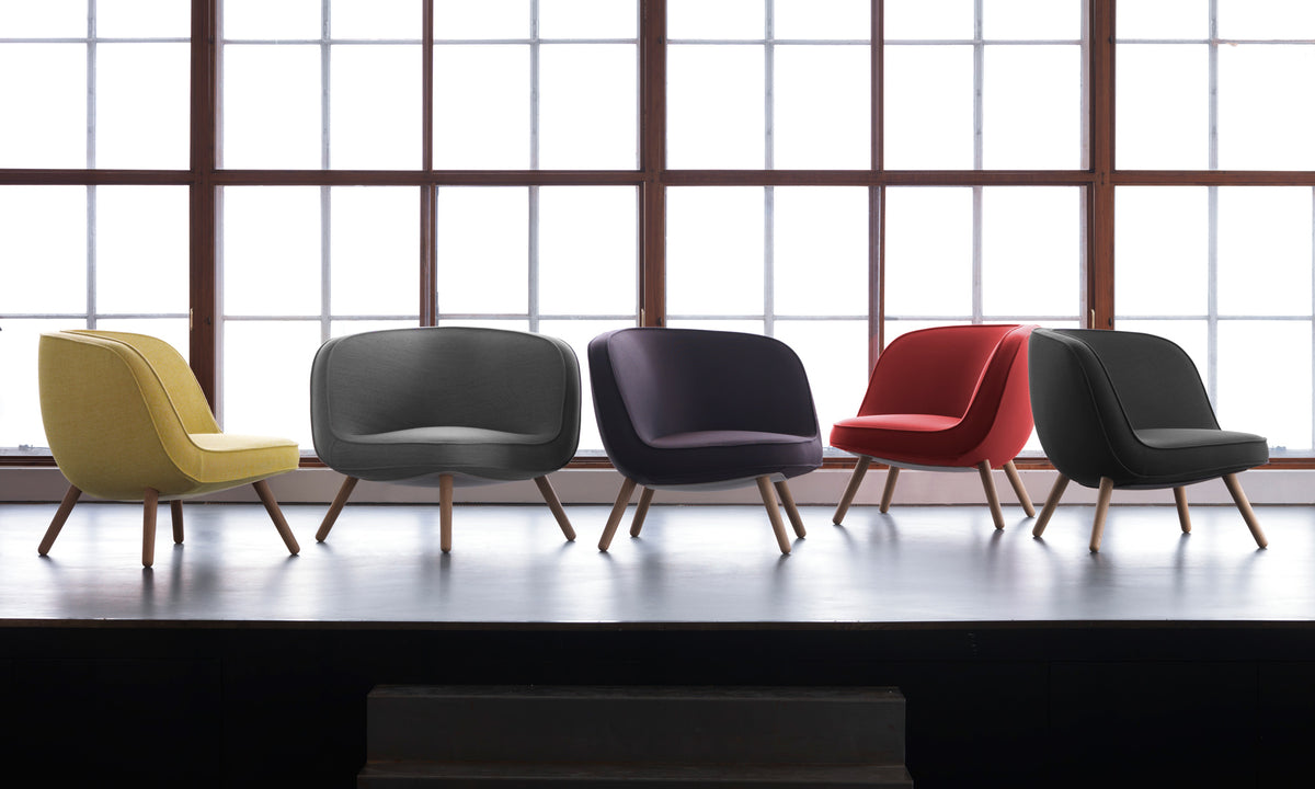 Via57 Lounge Chair by Fritz Hansen, showing via57 lounge chairs in live shot.