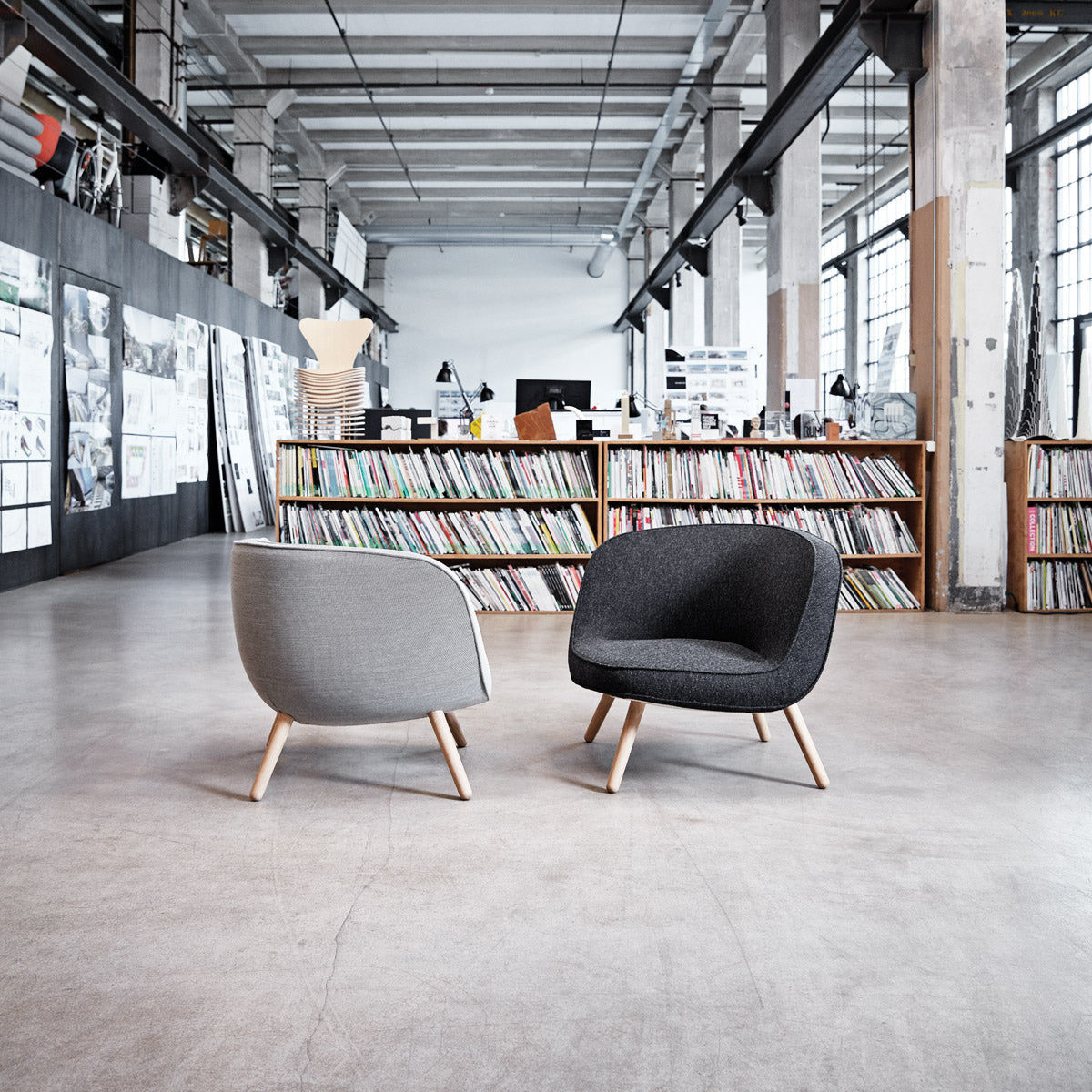 Via57 Lounge Chair by Fritz Hansen, showing via57 lounge chairs in live shot.