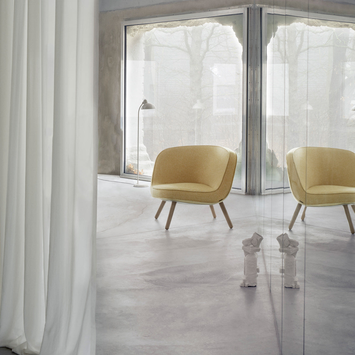 Via57 Lounge Chair by Fritz Hansen, showing via57 lounge chair in live shot.