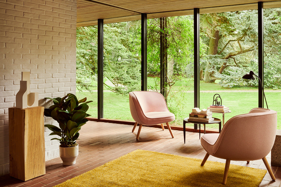 Via57 Lounge Chair by Fritz Hansen, showing via57 lounge chairs in live shot.