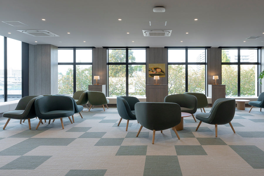 Via57 Lounge Chair by Fritz Hansen, showing via57 lounge chairs in live shot.