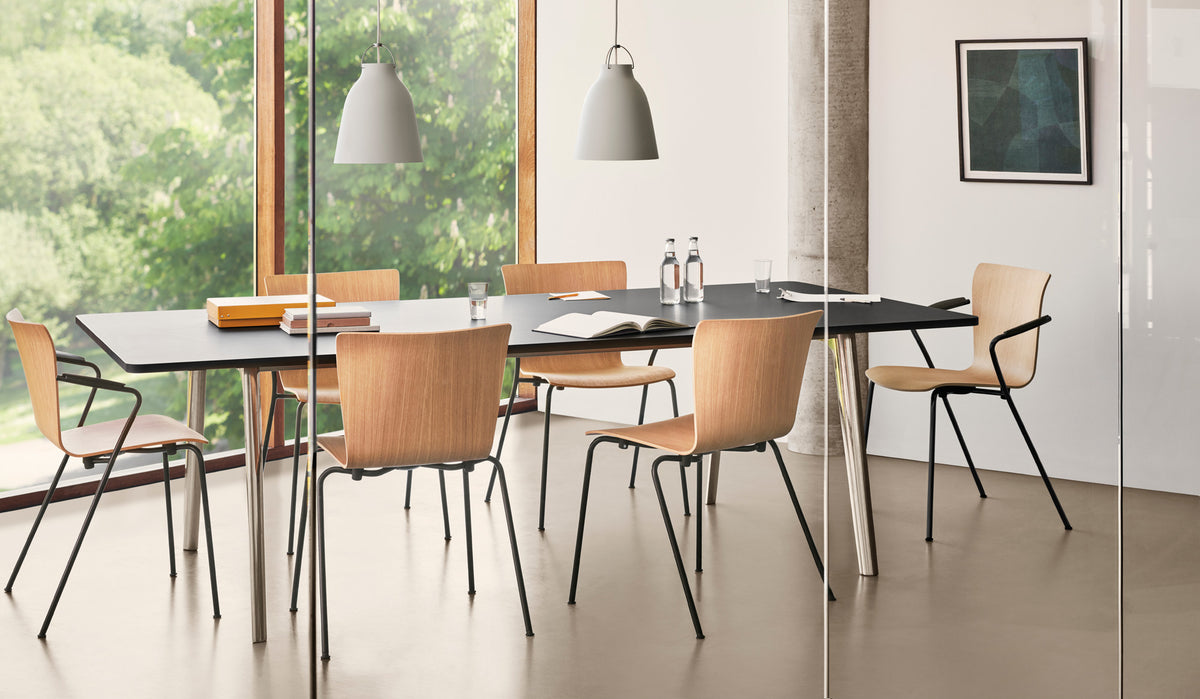 Vico Duo Armchair by Fritz Hansen, showing vico duo armchairs in live shot.