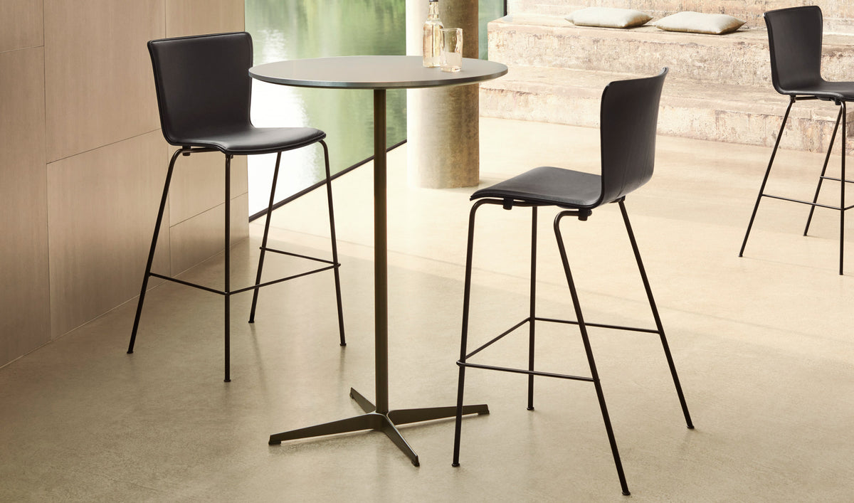 Vico Duo Bar Stool by Fritz Hansen, showing vico duo bar stools in live shot.