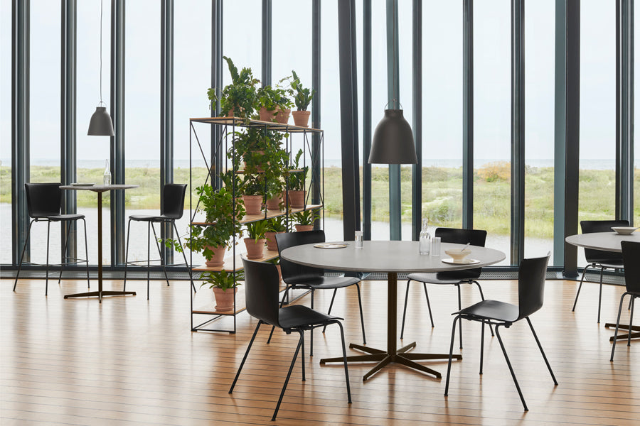 Vico Duo Bar Stool by Fritz Hansen, showing vico duo bar stools in live shot.