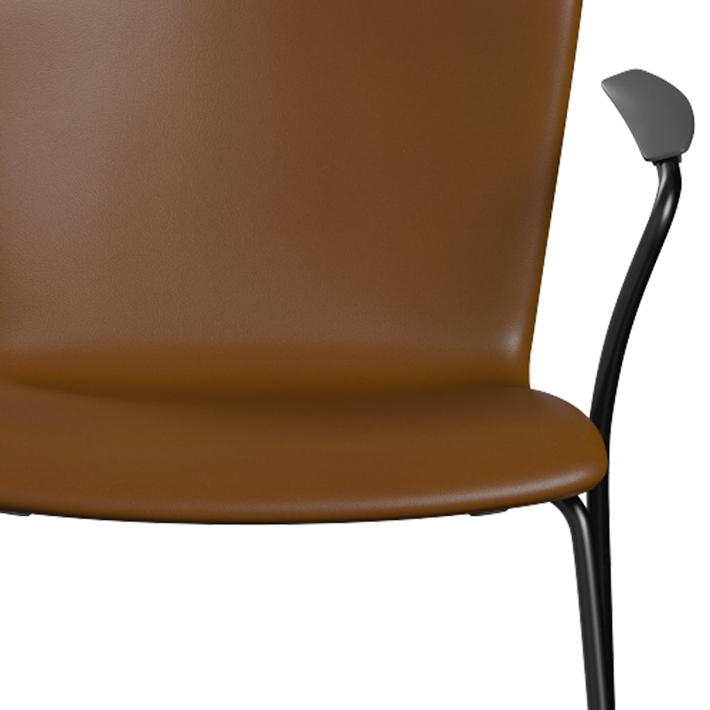 Vico Duo Full Upholstery Armchair by Fritz Hansen, showing closeup view of vico duo full upholstery armchair in black powder coated steel/leather category 4.