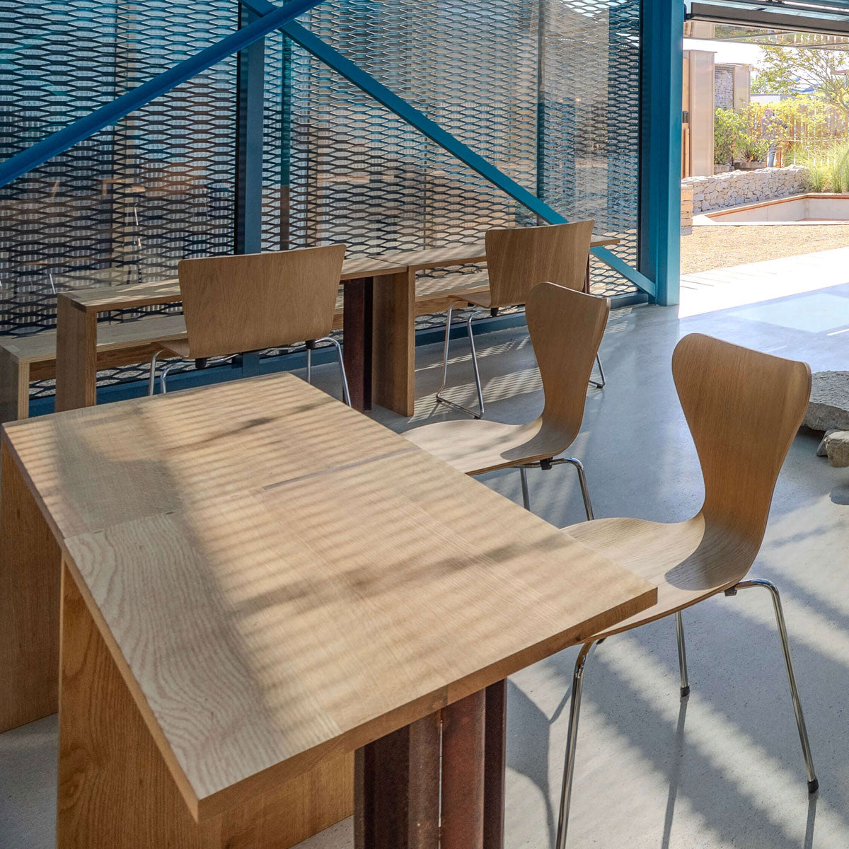 Vico Duo Sledge Chair by Fritz Hansen, showing vico duo sledge chairs in live shot.