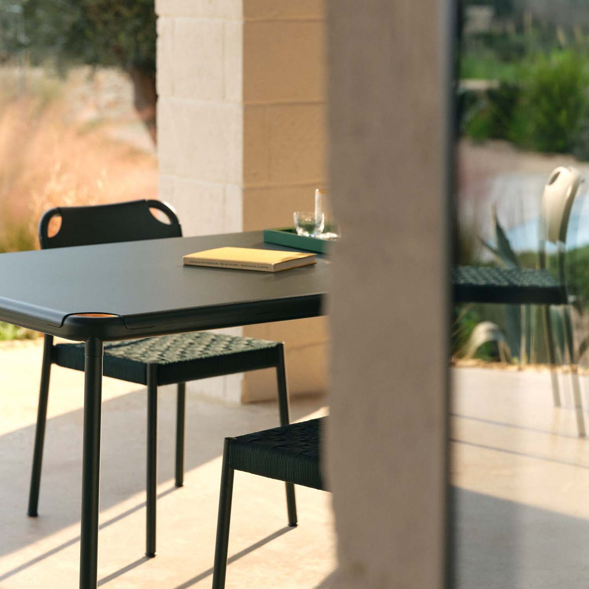 Vind Outdoor Chair by Skagerak, showing vind outdoor chair in live shot.