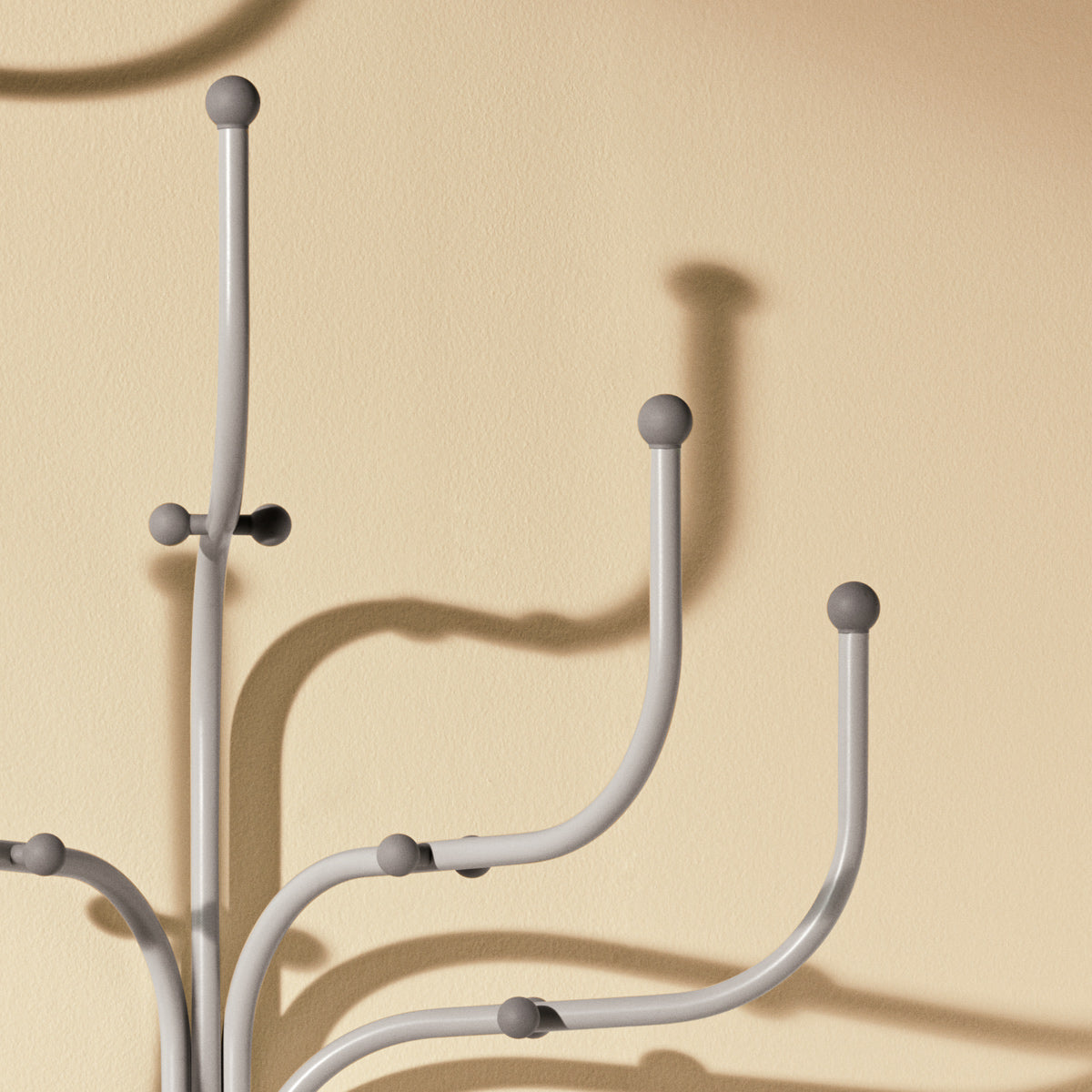 Wall Coat Tree by Fritz Hansen, showing closeup view of wall coat tree in live shot.