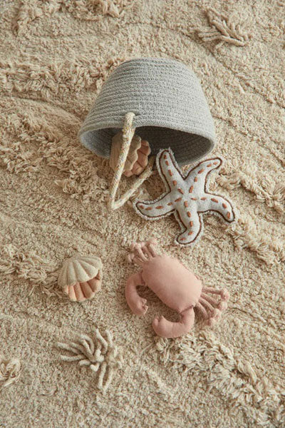 Sea Wonders Washable Rug by Lorena Canals, showing sea wonders washable rug in live shot.