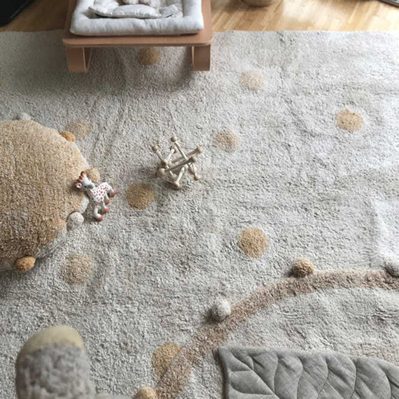 Polka Dots Washable Rug by Lorena Canals, showing polka dots washable rug in live shot.
