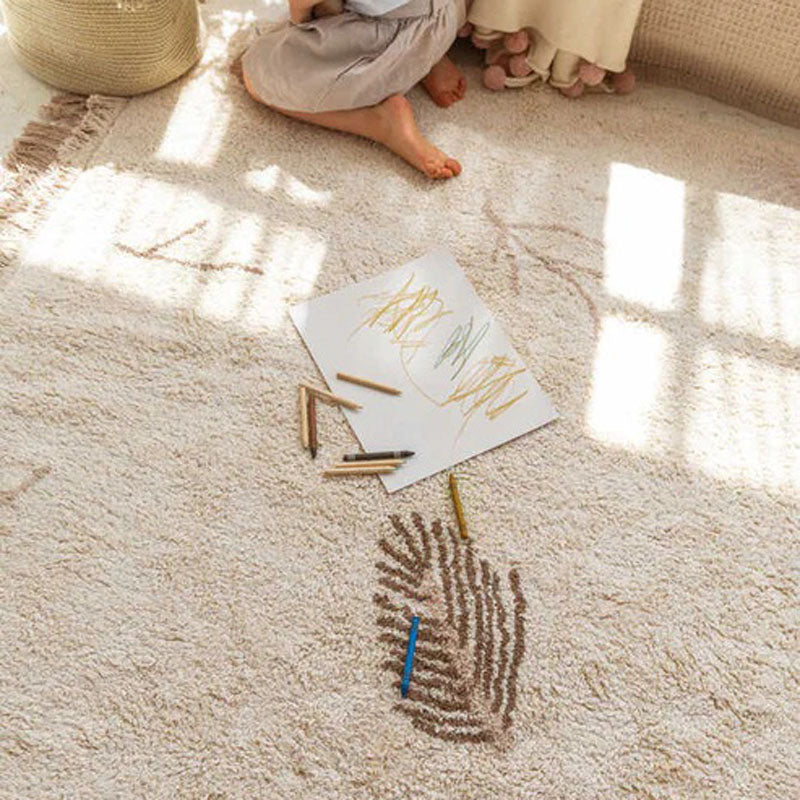 Pine Forest Washable Rug by Lorena Canals, showing pine forest washable rug in live shot.
