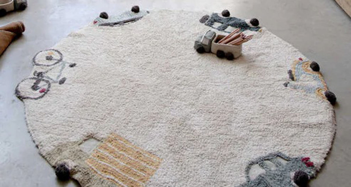 Wheels Washable Rug by Lorena Canals, showing wheels washable rug in live shot.