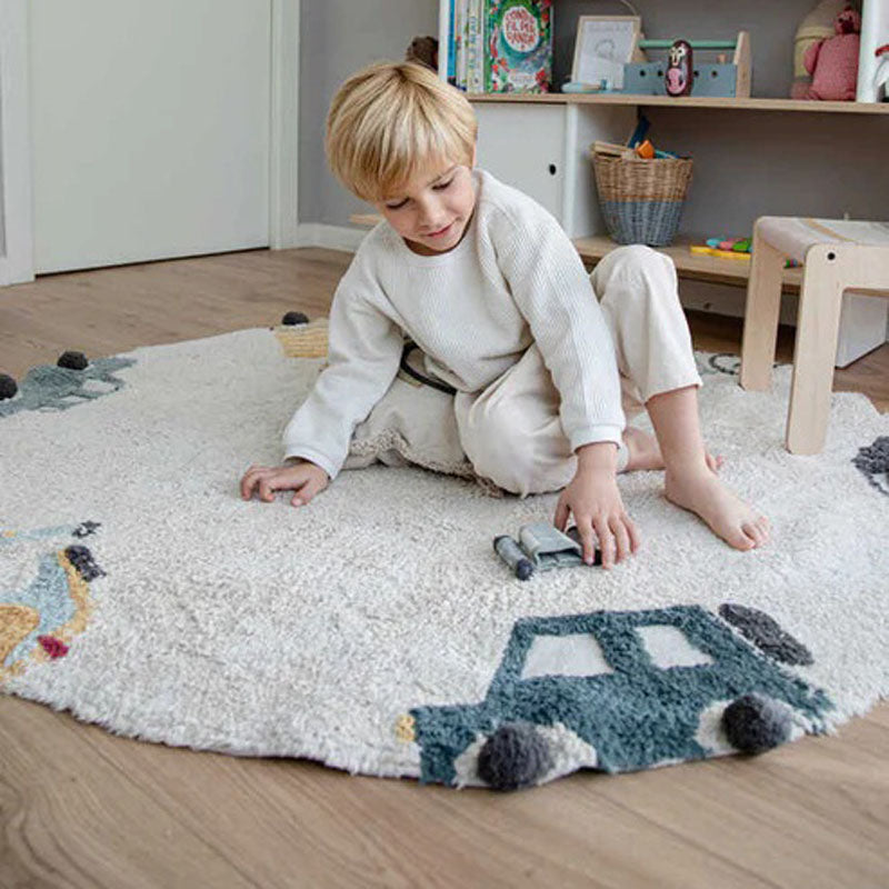 Wheels Washable Rug by Lorena Canals, showing wheels washable rug in live shot.