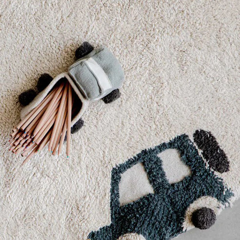 Wheels Washable Rug by Lorena Canals, showing wheels washable rug in live shot.
