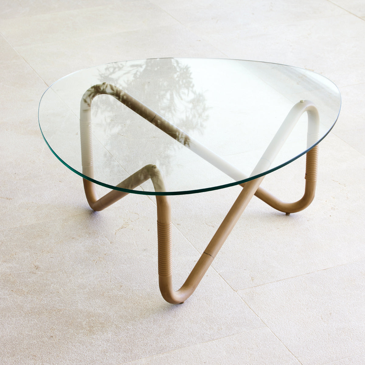 Wave Outdoor Coffee Table by Cane-Line, showing wave outdoor coffee table in live shot.