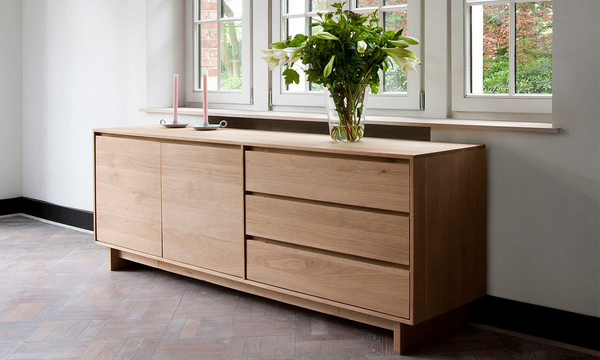 Wave Sideboard by Ethnicraft, showing wave sideboard in live shot.