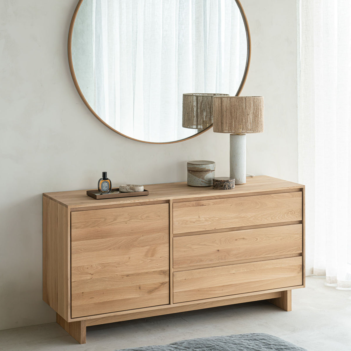 Wave Sideboard by Ethnicraft, showing wave sideboard in live shot.
