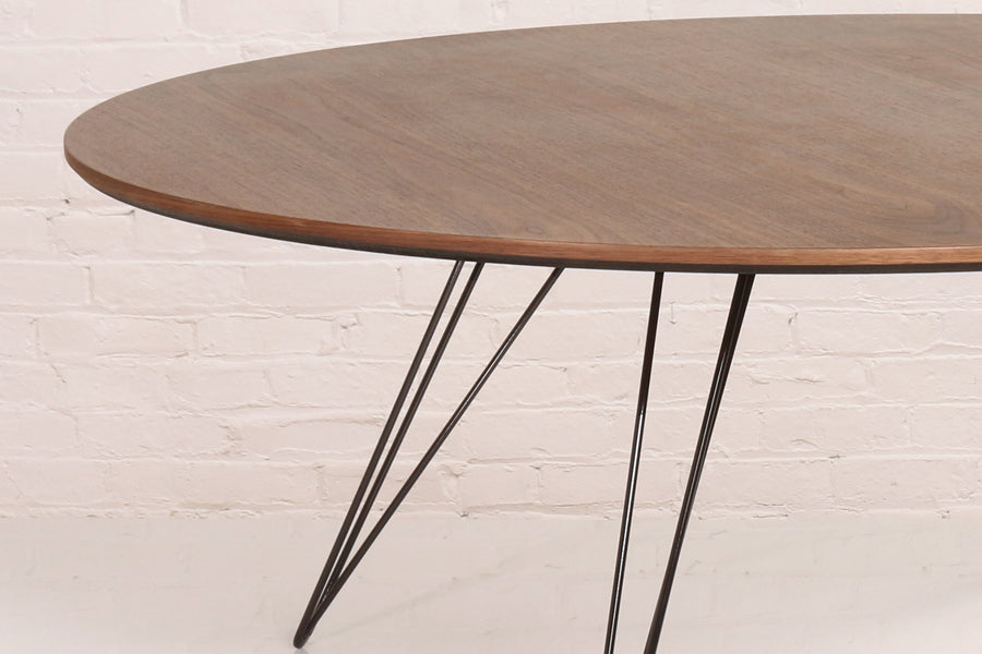 Williams Oval Coffee Table by Tronk Design, showing closeup view of williams oval coffee table in live shot.