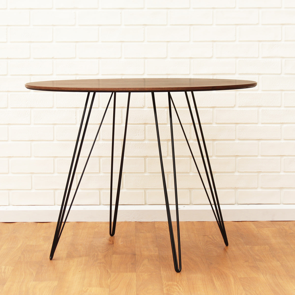 Williams Oval Dining Table by Tronk Design, showing williams oval dining table in live shot.