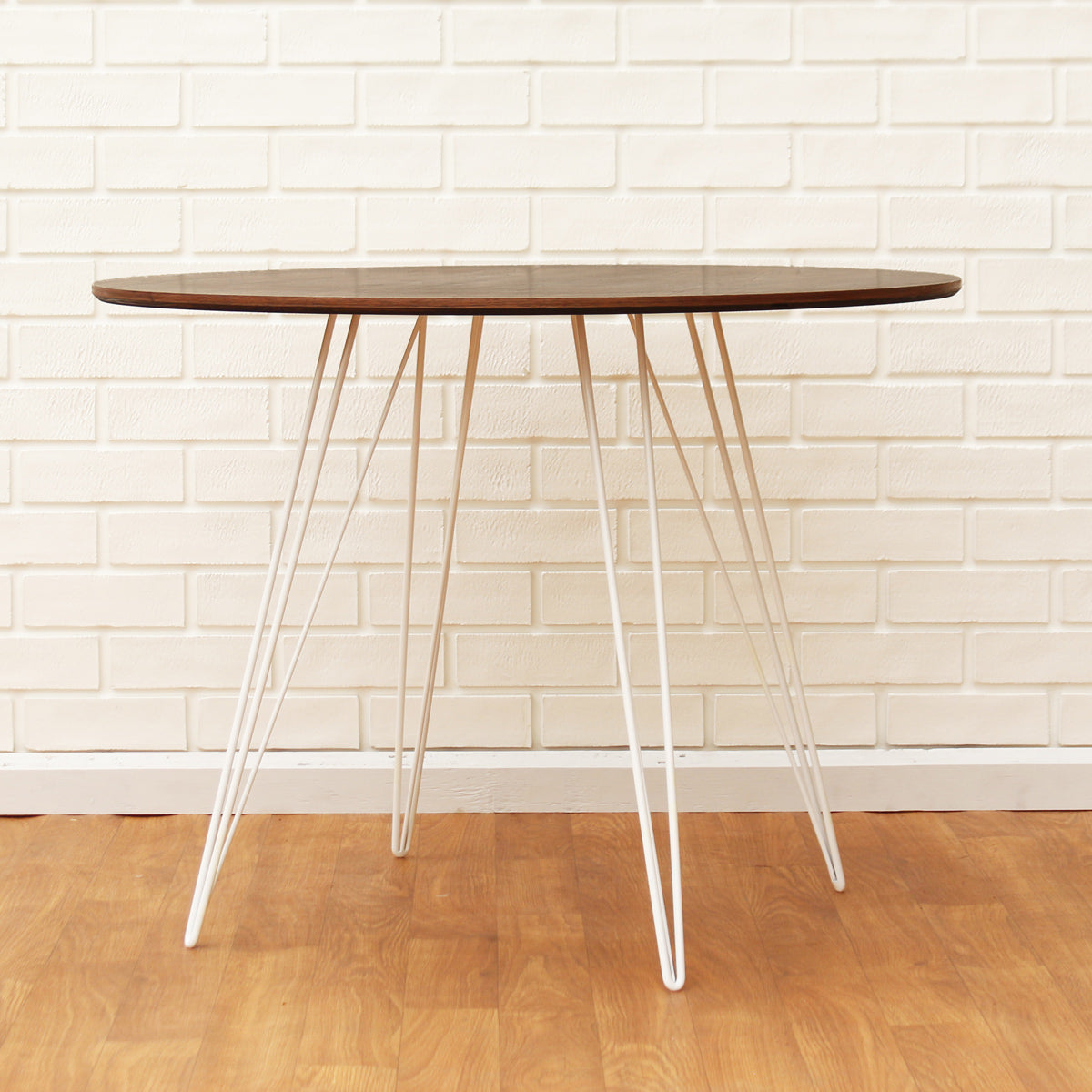 Williams Oval Dining Table by Tronk Design, showing williams oval dining table in live shot.