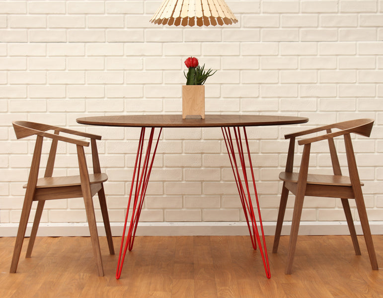 Williams Oval Dining Table by Tronk Design, showing williams oval dining table in live shot.