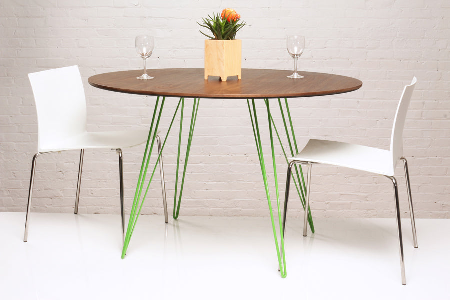 Williams Oval Dining Table by Tronk Design, showing williams oval dining table in live shot.