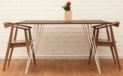 Williams Rectangle Dining Table by Tronk Design, showing williams rectangle dining table in live shot.
