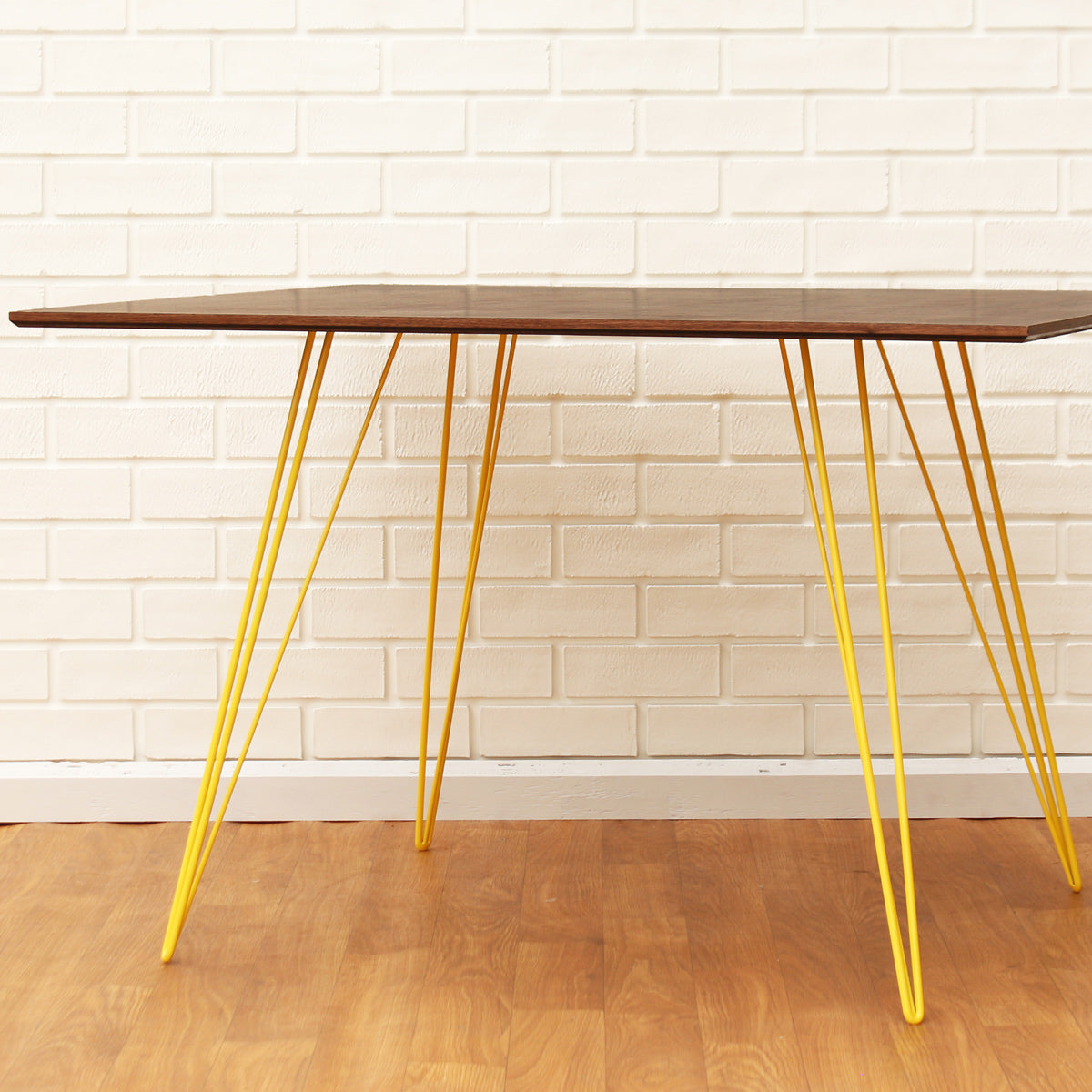 Williams Rectangle Dining Table by Tronk Design, showing williams rectangle dining table in live shot.