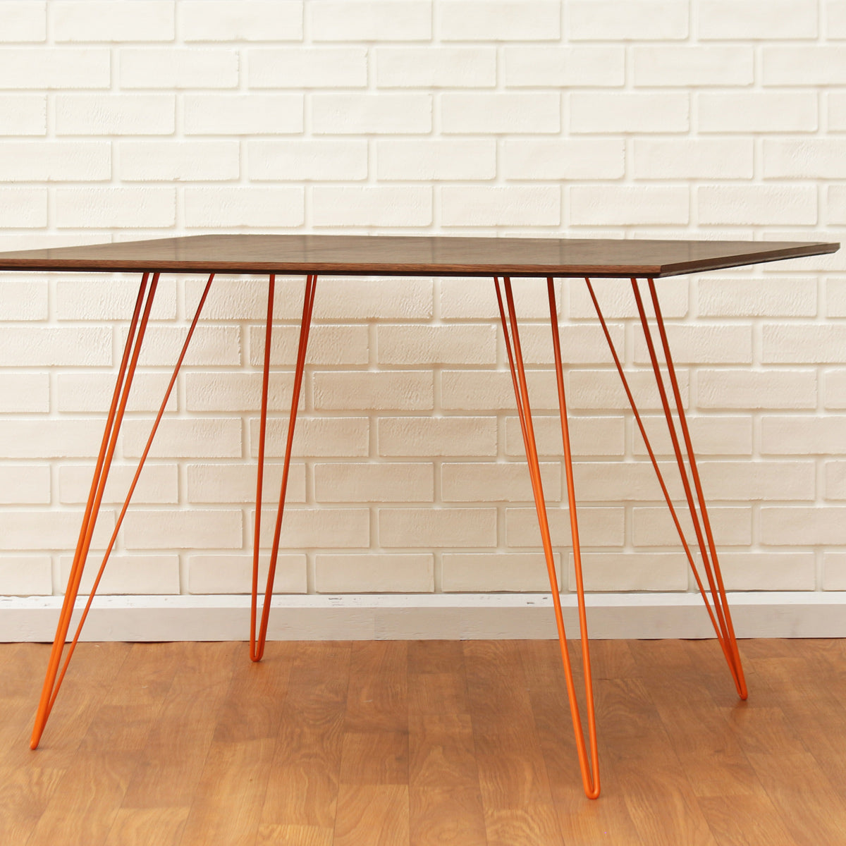 Williams Rectangle Dining Table by Tronk Design, showing williams rectangle dining table in live shot.