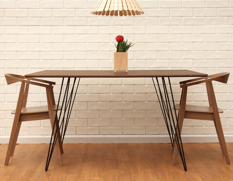 Williams Rectangle Dining Table by Tronk Design, showing williams rectangle dining table in live shot.