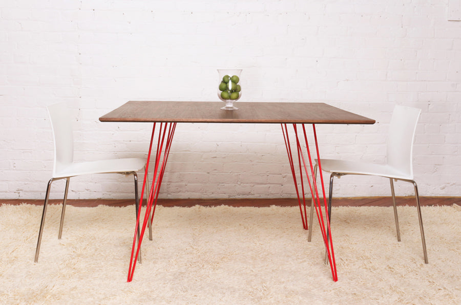 Williams Rectangle Dining Table by Tronk Design, showing williams rectangle dining table in live shot.