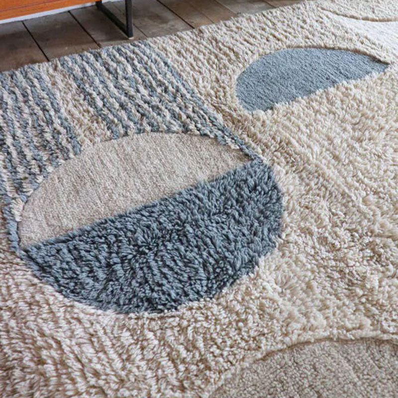 Woolable Sun Rays Rug by Lorena Canals, showing woolable sun rays rug in live shot.