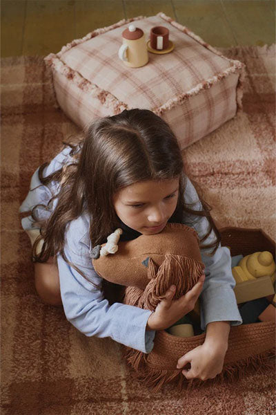 Wouf Handloom Pouf by Lorena Canals, showing wouf handloom pouf in live shot.