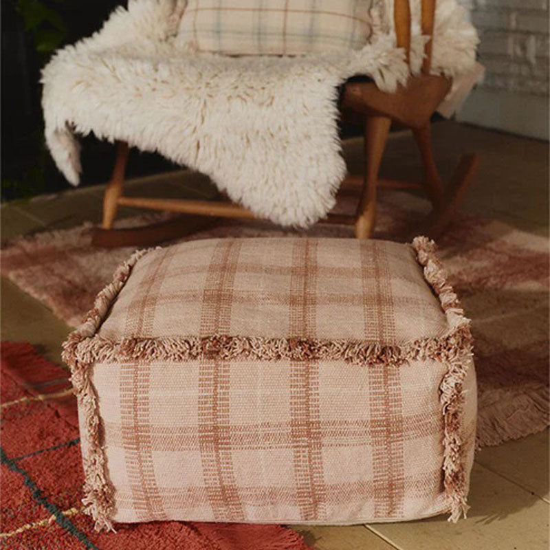 Wouf Handloom Pouf by Lorena Canals, showing wouf handloom pouf in live shot.