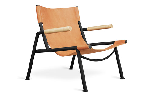 Wyatt Sling Chair by Gus, showing angle view of wyatt sling chair.