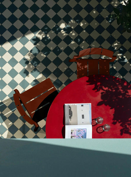 Yard Chair by Toou, showing yard chairs in live shot.