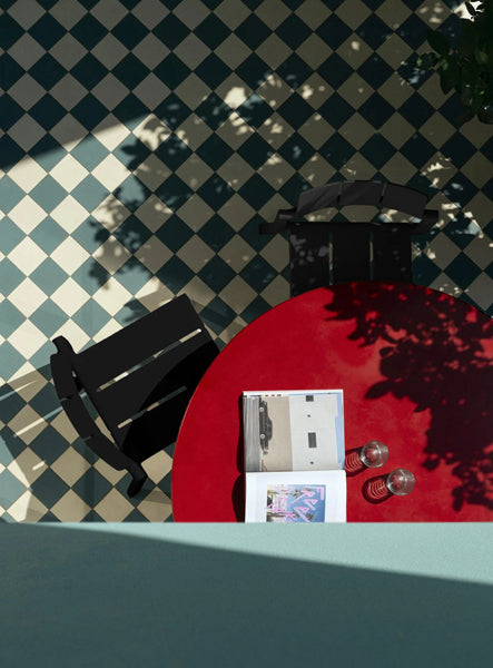 Yard Chair by Toou, showing yard chairs in live shot.