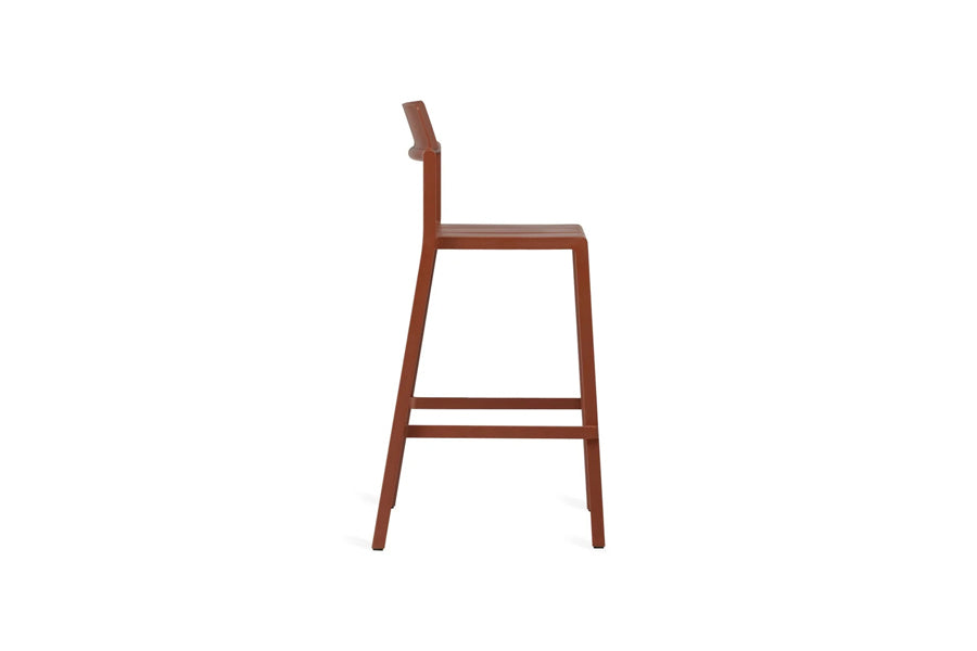 Yard Stool by Toou, showing side view of bar/yard stool in rust red pp.