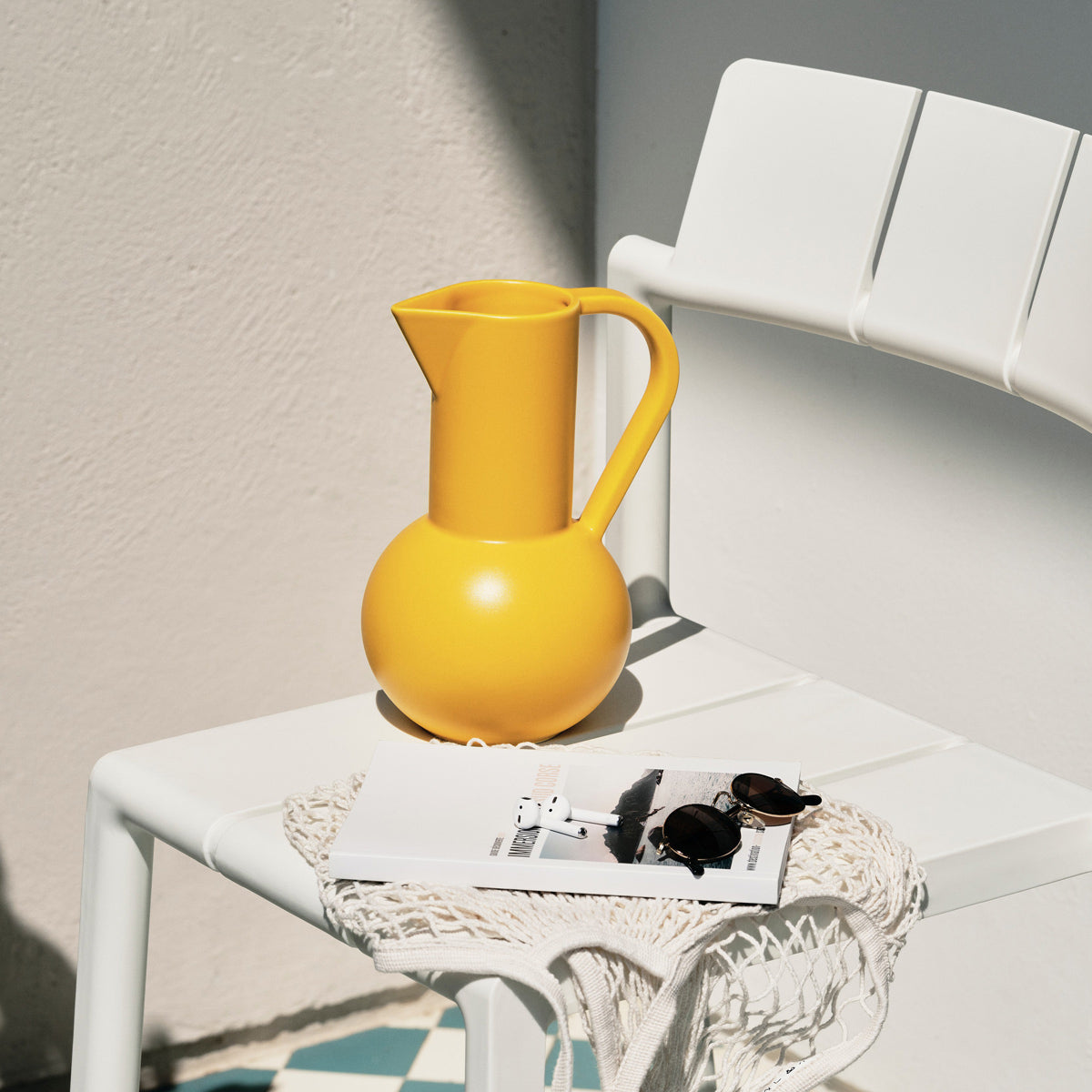 Yard Stool by Toou, showing closeup view of yard stool in live shot.