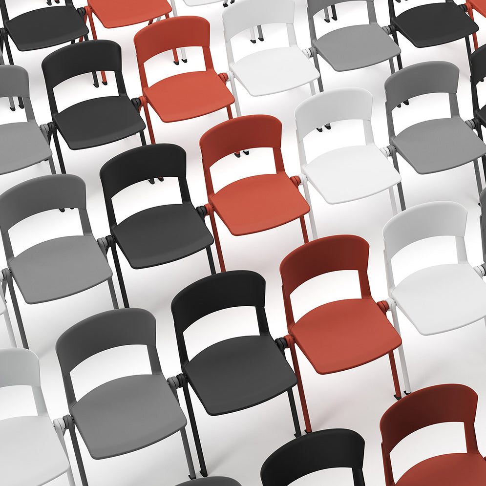 Yugen Chair with Polished Aluminum Right Handed Armrest Tablet by Kollektiff, showing yugen chairs with polished aluminum right handed armrest tablet in live shot with no armrests.