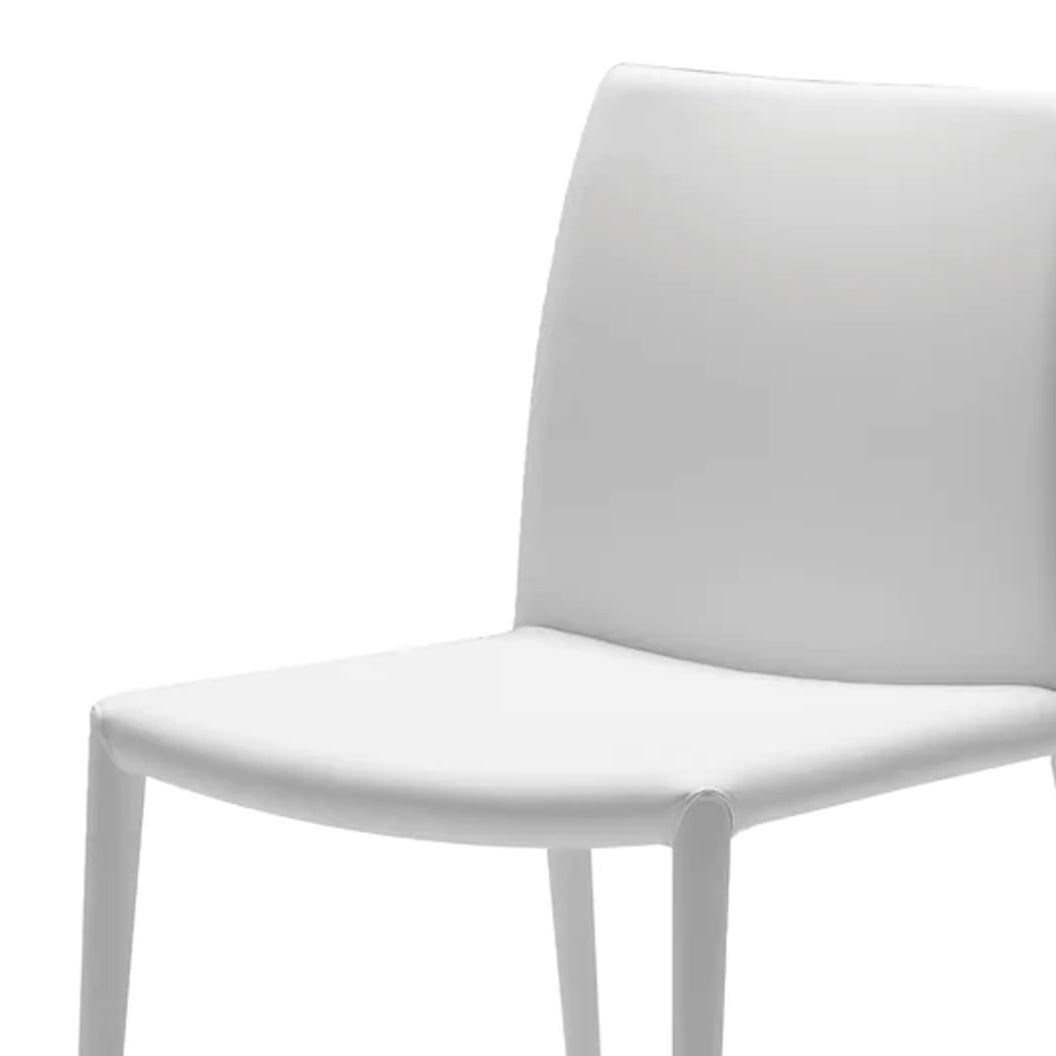 Zeno Dining Chair by Mobital, showing closeup view of zeno dining chair in white leatherette.