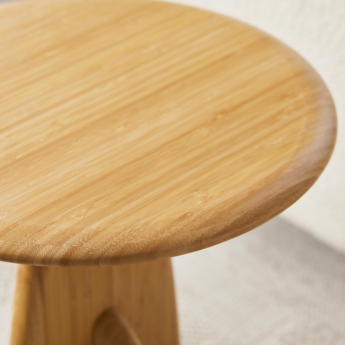 Zephyr Side Table by Greenington, showing closeup view of zephyr side table in live shot.