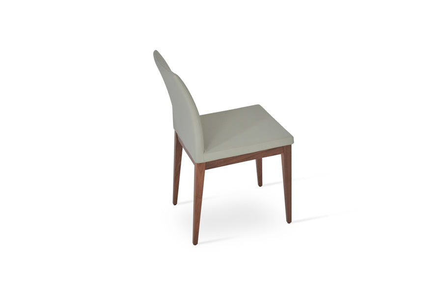 Zeyno Wood Chair by SohoConcept, showing different side view of zeyno wood chair in original american walnut wood/light grey leatherette.